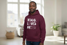Load image into Gallery viewer, Man wearing a maroon hoodie with 'Jesus Loves Me' text in a bright room.