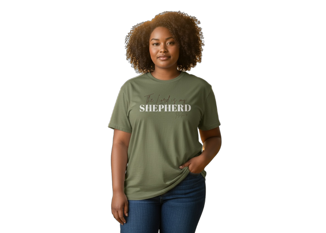 Woman wearing a green t-shirt with 'Shepherd' printed on it against a white background