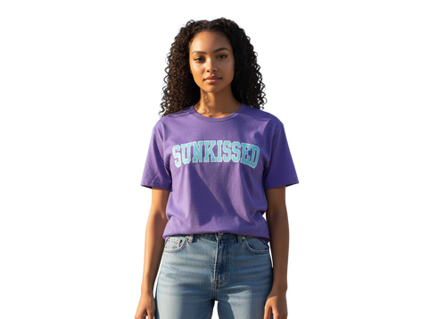 Person wearing a purple 'SUNKISSED' t-shirt on a white background