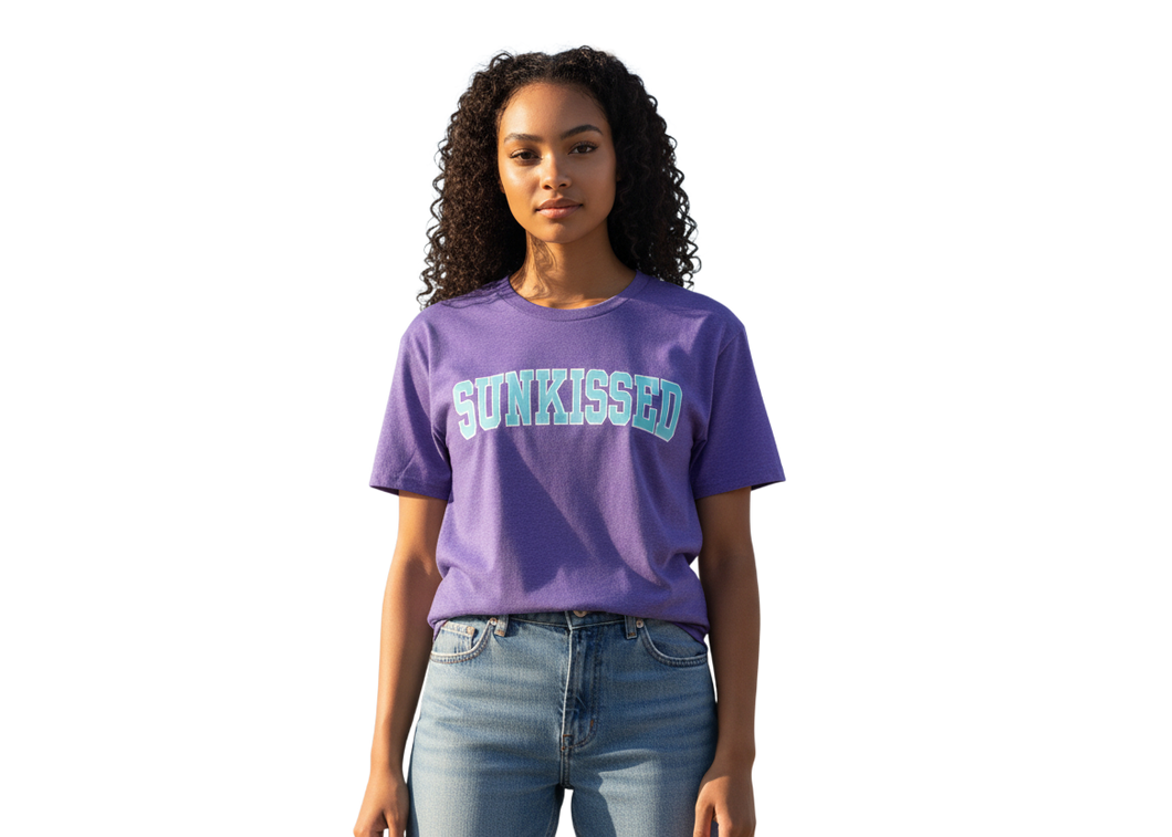 Person wearing a purple 'SUNKISSED' t-shirt on a white background
